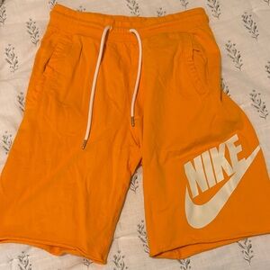 Nike youth size small (boys)Orange Logo Performance Shorts